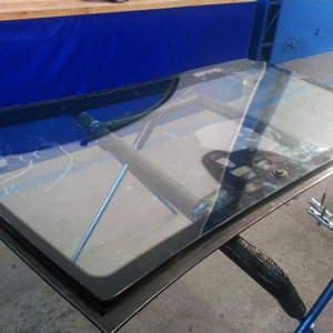 Reparo de vidro blindado delaminado